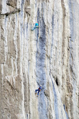 Climbers on a big limestone wall