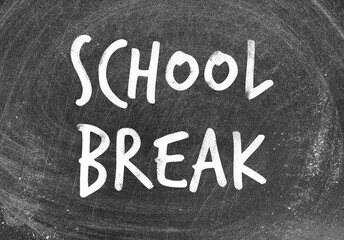 Fototapeta premium Text School Break on black chalkboard. Seasonal holidays