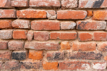 Obraz premium Orange red brick wall pattern. Orange brick texture.