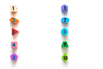 Colorful number blocks in different shapes lined in two columns vertically. Can be used for illustration or background of ordered list.