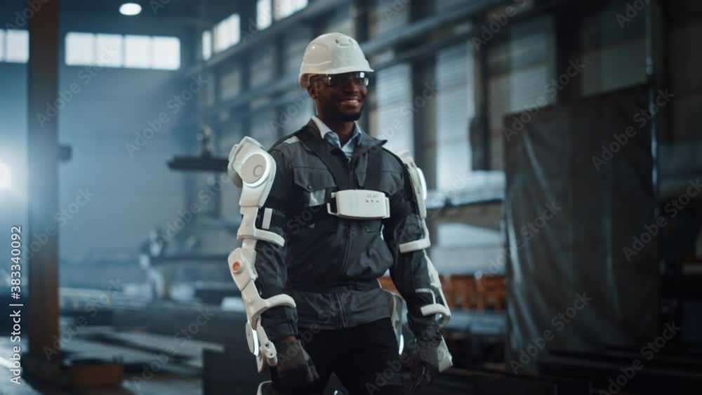 Aufkleber black african american engineer is testing a futuristic bionic exoskeleton and proudly wearing it in