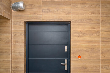 Modern gas boiler room with brown ceramic tiles imitating wood, empty room without installation,...