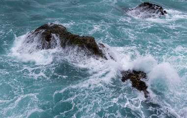 wave crashing on the rocks