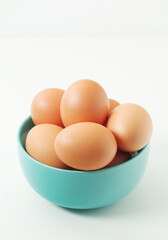 A bowl with chicken eggs	