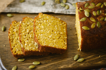 Gluten Free Pumpkin bread loaf set white cafe table.