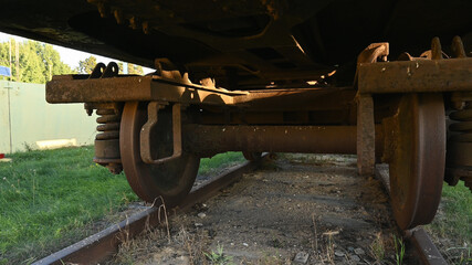 rusty wheels of a freight train