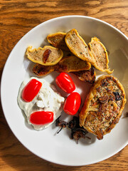 the delicious Swabian speciality Maultaschen served on a plate