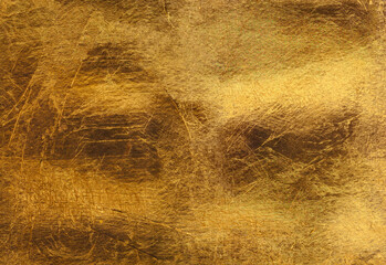 Gold background. Texture of gold metal