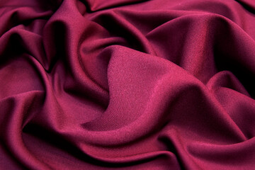 Naklejka na ściany i meble Wool fabric. The color is red. Texture, background, pattern.