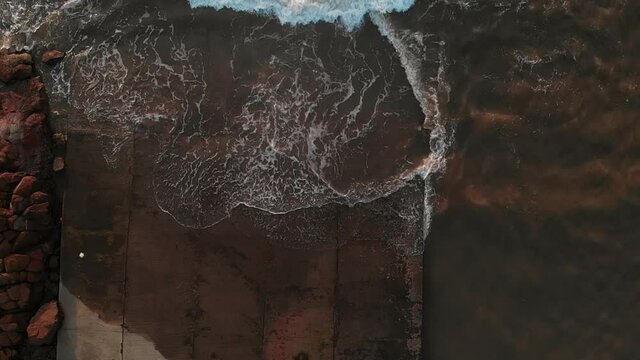 sea waves crashing over doc top view gorai uttan  indian