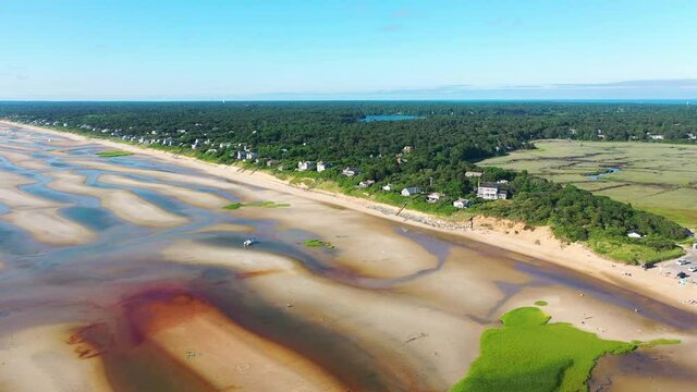 Cape Cod Bay Aerial Drone Footage of Bay Side Beach at Low Tide and Beach Houses with Sand Dunes and Marsh