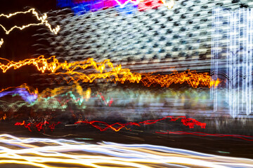Light wave abstract motion background. Neon blur effect, blue energy dynamic waveform with twist and curve pattern. Nightlife flare in twilight on speed highway at long exposure