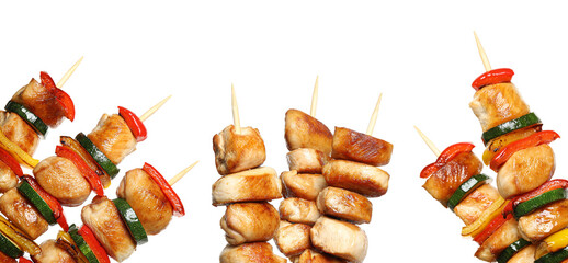 Set of delicious chicken shish kebabs on white background. Banner design