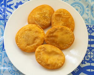 Fried Dominican pastelito or fried patties or turnover 