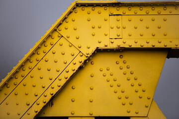 Steel gritty textures with mood and patterns for backgrounds with a yellow theme. 