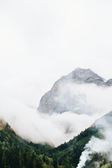 Cloudy and rainy morning in mountains in Russia, Dombay