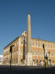 Fototapeta na wymiar Ancient Egyptian obelisk and building in Rome. Italy. Europe