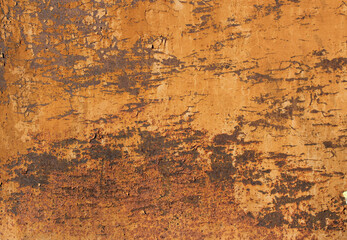 rusty metal with corrosion peeling orange paint
