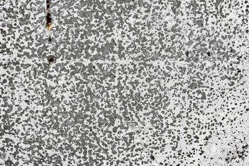 Texture of a concrete wall with cracks and scratches which can be used as a background