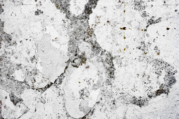 Texture of a concrete wall with cracks and scratches which can be used as a background