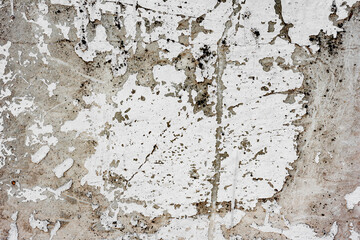 Texture of a concrete wall with cracks and scratches which can be used as a background