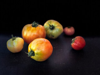 tomatoes on black