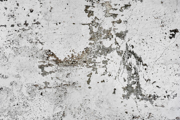 Texture of a concrete wall with cracks and scratches which can be used as a background