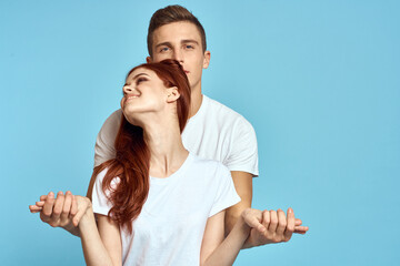 Man and woman family relationship blue background love cropped view romance