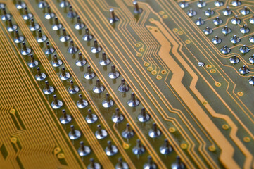 pins on the back of the motherboard close-up.