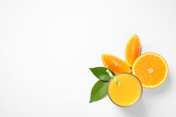 Glass of orange juice and fresh fruits on white background, top view