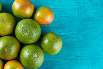 Orange fruit closeup. Tropical fruits. Copy space.