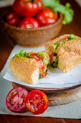 Delicious and Tasty Sandwiches on wood cutting board tomatoes
