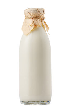 Glass milk bottle isolated on white background