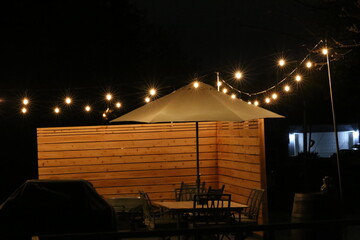 Bistro patio lighting - warm and welcoming.