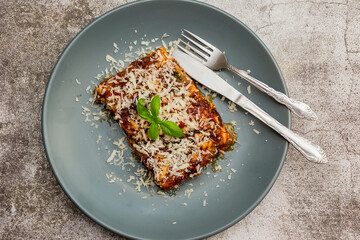 Parmigiana di Melanzane - strips of fried eggplant with parmesan