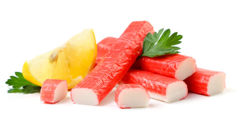 Crab sticks, parsley and lemon slice on a white background. Isolated © innafoto2017