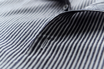 Close up of men's striped shirt.	
