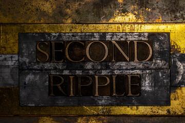 Second Ripple text message on textured grunge copper and vintage gold background