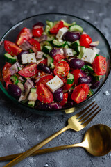 Greek salad on grey surface