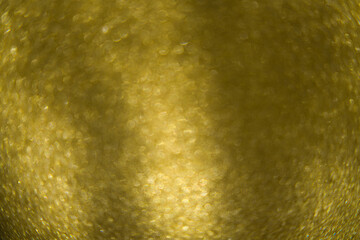Hintergrund mit goldfarbenen Bokeh Effekt