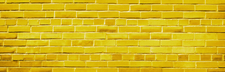 Yellow empty brick old wall. Panorama. Banner.