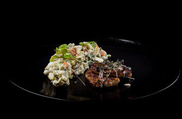 Fried meat and salad Olivier in Georgian style