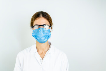 Doctor wearing medical mask to protect against coronavirus 2019 disease or COVID-19 global outbreak