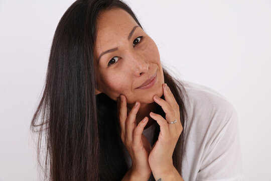 Authentic Smiling Asian Woman Portrait. Imperfect And True Beauty. Realism And Diversity Concept