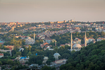 View of Istanbul at sunset from above with trees buildings