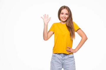 Smiling young woman with waving hand, business, education, office, greeting concept standing over white isolated background