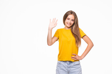 Obraz na płótnie Canvas Smiling young woman with waving hand, business, education, office, greeting concept standing over white isolated background