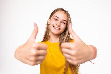 Happy beautiful woman showing thumb up symbol by two hands isolated on white background