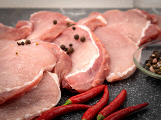 Fresh meat is cut into steaks
