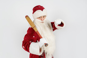 Santa Claus with a baseball bat in his hands. Isolated on white